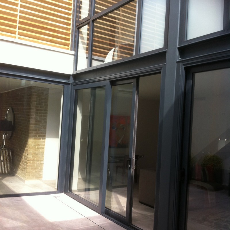 Anthracite aluminium sliding patio doors fitted in Northwood