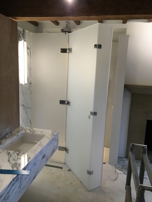 Bespoke frosted glass shower enclosure in Northwood luxury bathroom