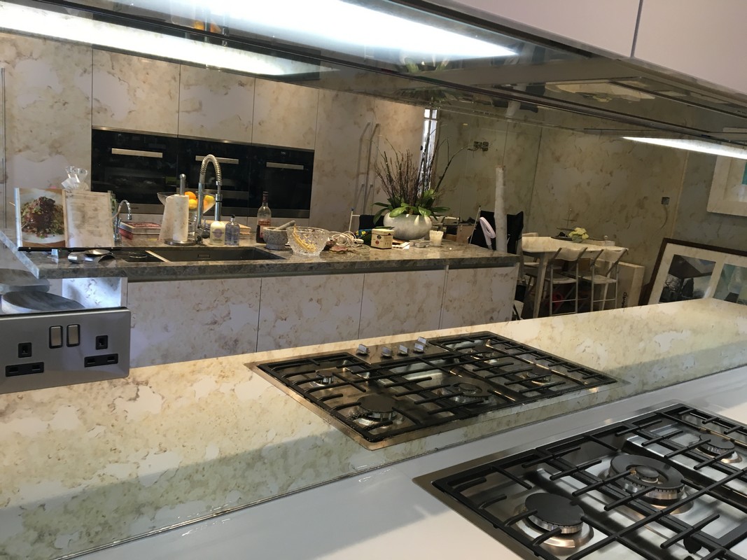 Mirror glass splashback in Northwood luxury kitchen